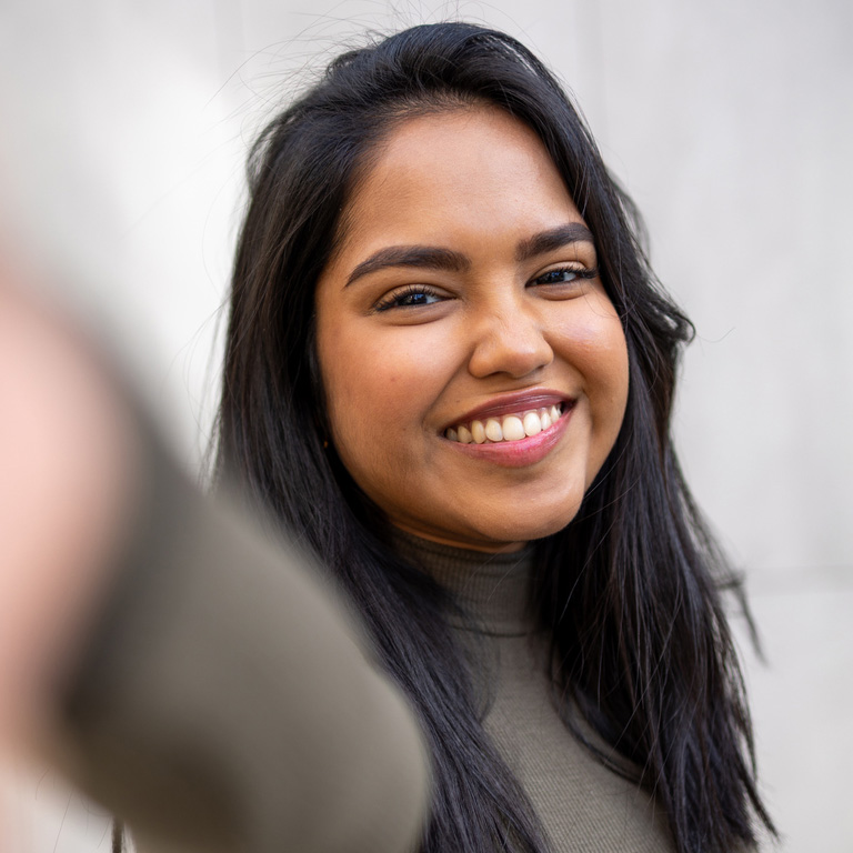 a woman smiling for the camera