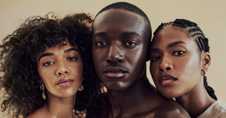 a group of people posing for the camera