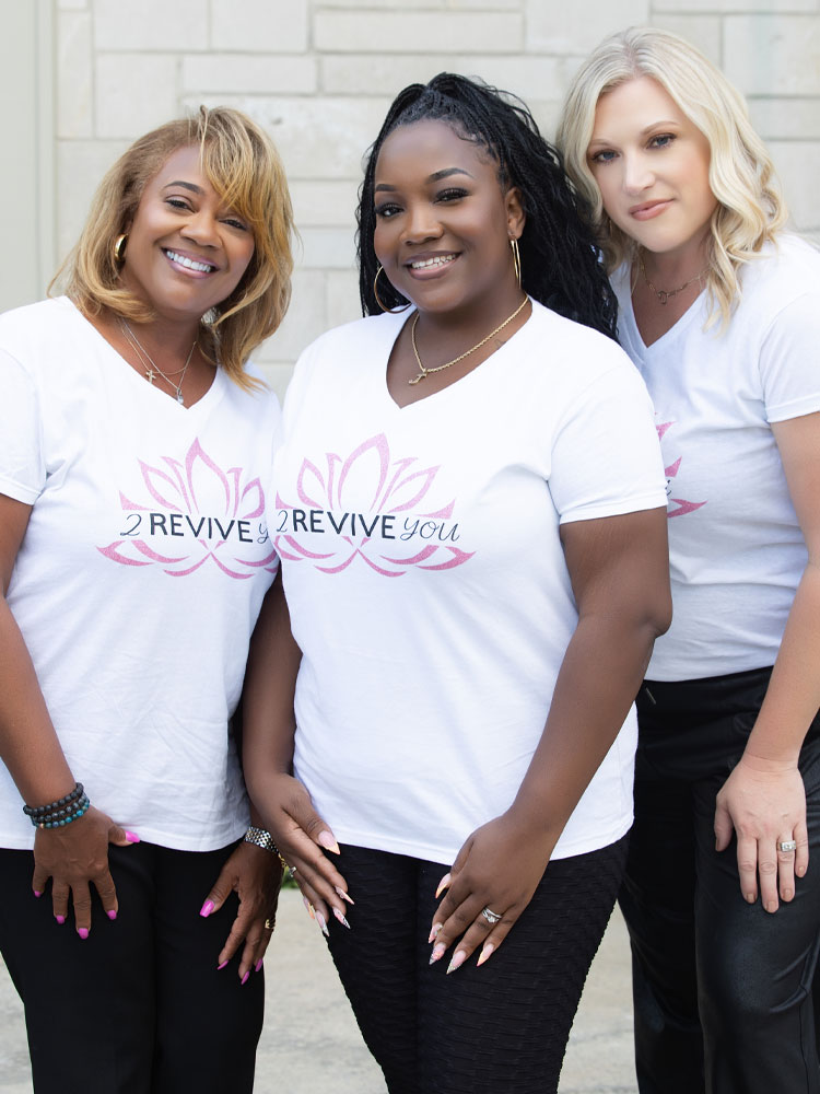 a group of people posing for the camera