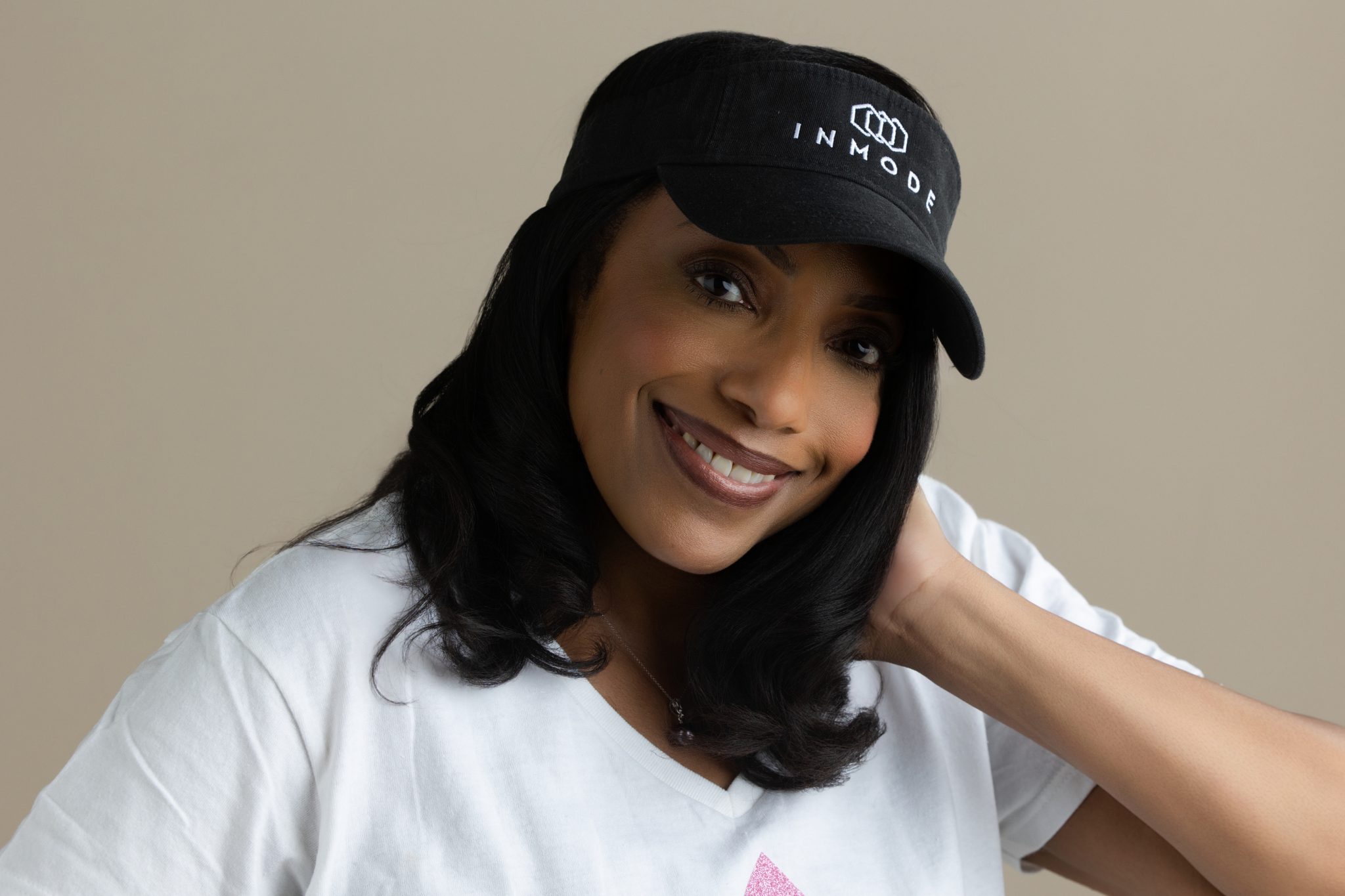 a close up of a woman wearing a hat